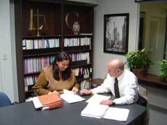 Image of an attorney assisting a client
